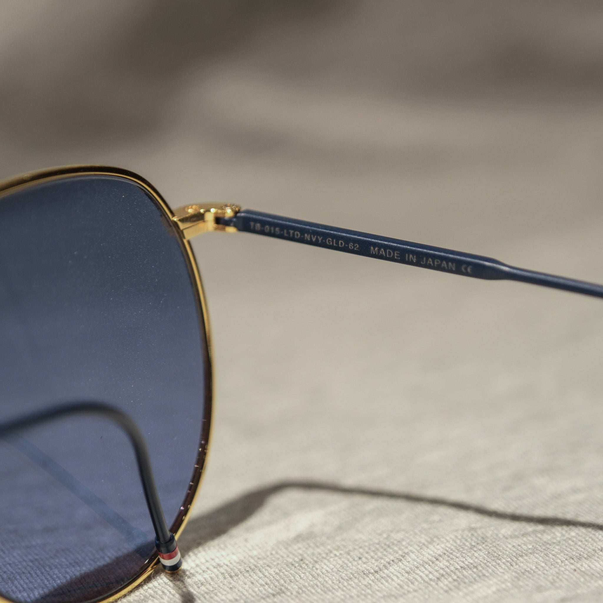 Thom Browne Navy/Gold Sunglasses – BROGUE