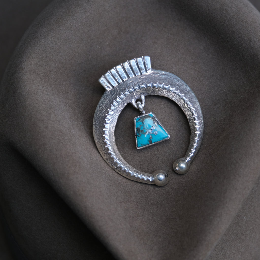 Navajo Sandcast Morenci Turquoise Pendant