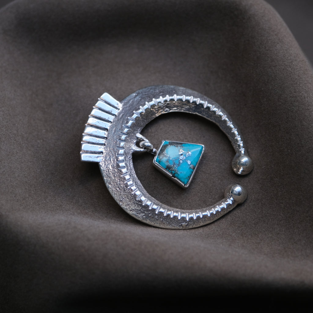 Navajo Sandcast Morenci Turquoise Pendant