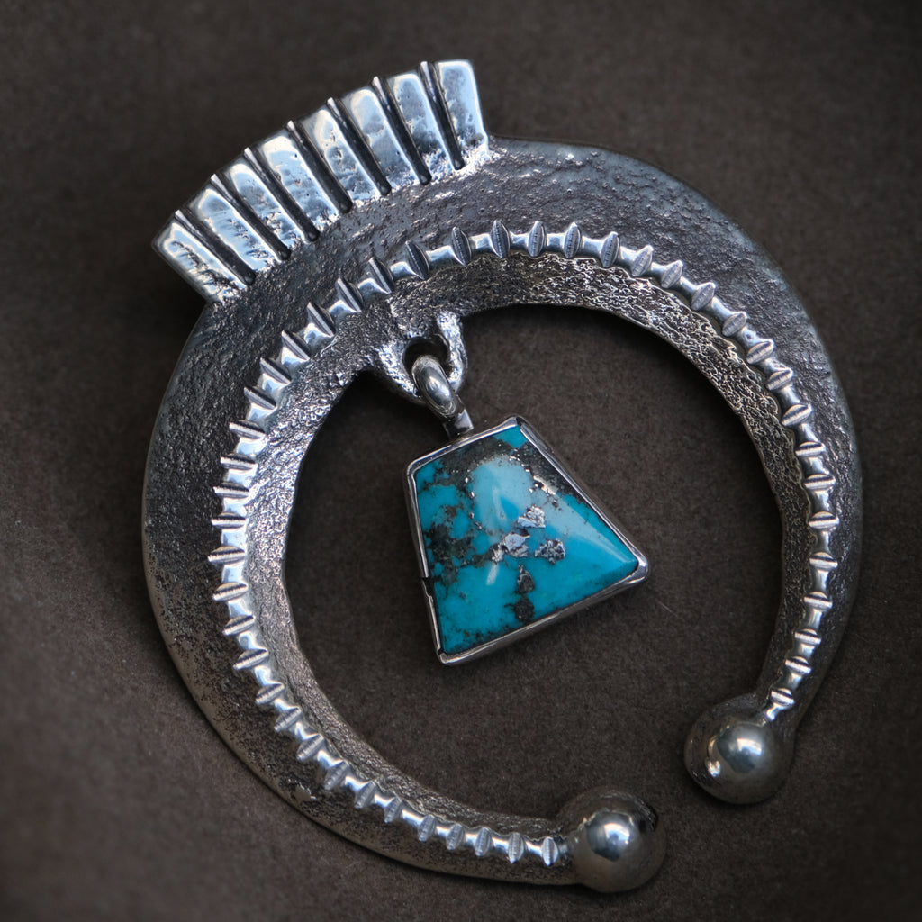 Navajo Sandcast Morenci Turquoise Pendant